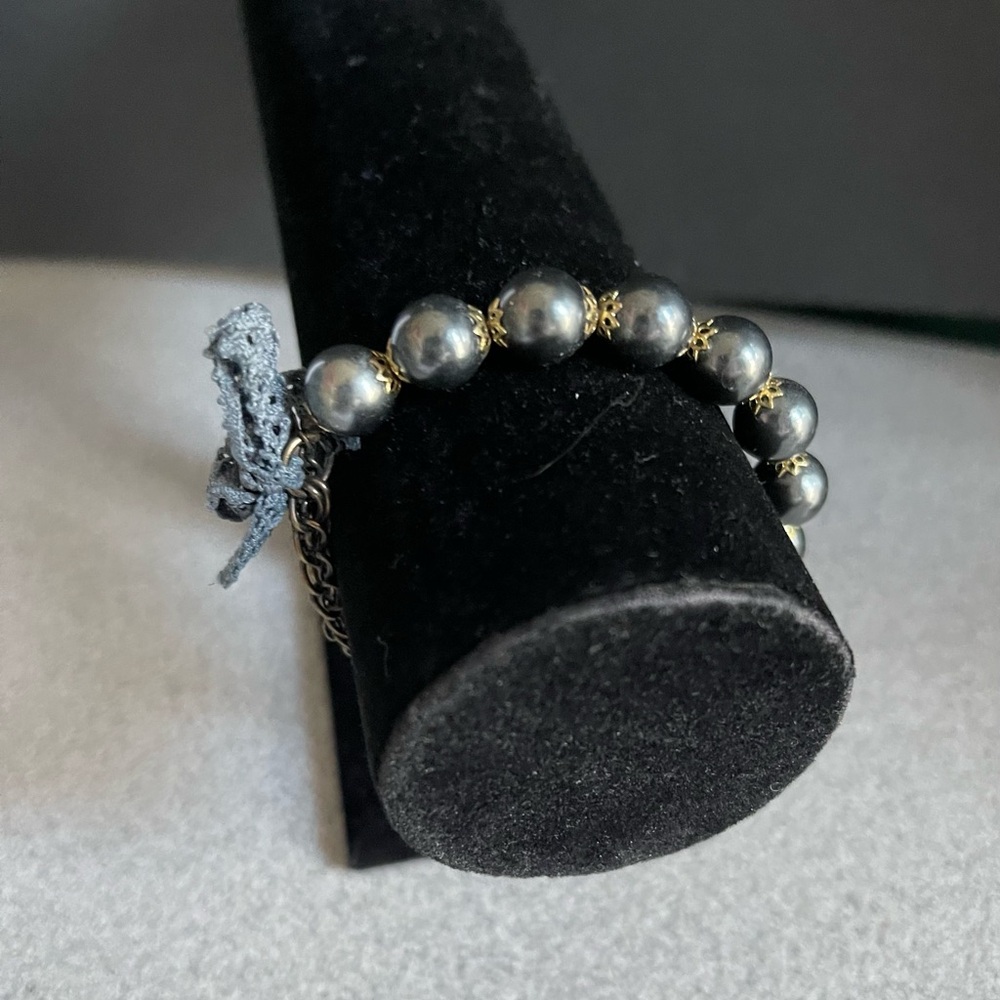 Dark Grey Beaded Chain Bracelet With A Key Charm